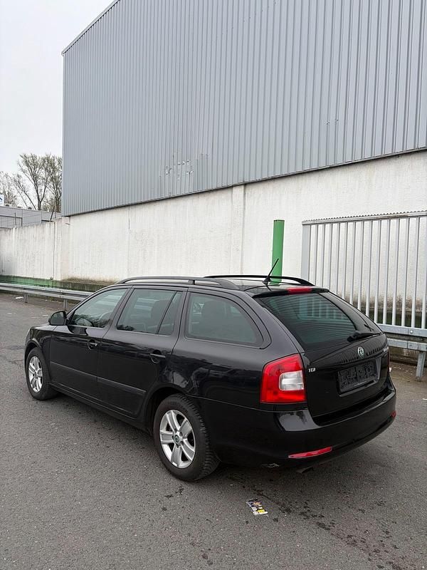 Second-hand Skoda Octavia 105 CP (77 kW) 2012 Negru Break