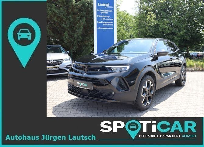 Black metallic Gebraucht 2024 Opel Mokka SUV | 21.450 € (Fairer Preis) - Bild 1/4