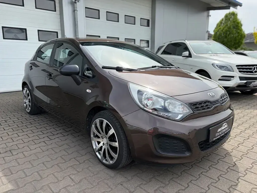 Gebraucht Kia Rio 86 PS (63 kW) 2012 Braun Limousine