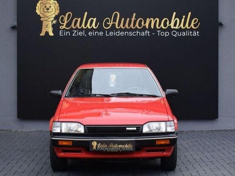 Gebraucht Mazda 323 75 PS (55 kW) 1988 Rot Kleinwagen