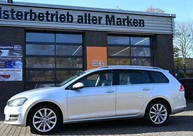 Second-hand VW Golf VII Highline 125 CP (91 kW) 2014 Argintiu Break