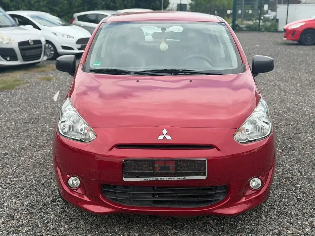 Gebraucht Mitsubishi Space Star Basis 71 PS (52 kW) 2014 Rot Van / Kleinbus