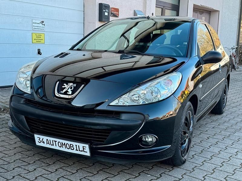 Gebraucht Peugeot 206+ 75 PS (55 kW) 2010 Schwarz Kleinwagen