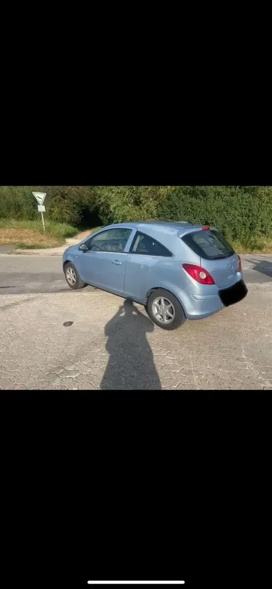 Second-hand Opel Corsa 59 CP (43 kW) 2009 Albastru Hatchback