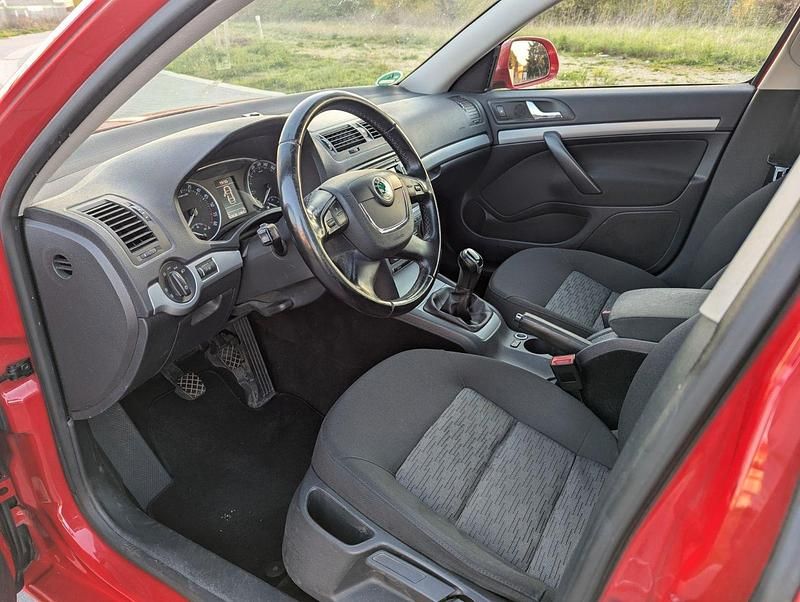 Second-hand Skoda Octavia Ambition 105 CP (77 kW) 2013 Roșu Break