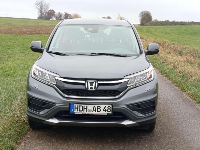 Grau Gebraucht 2016 Honda CR-V Comfort SUV | 18.500 € (Fairer Preis) - Bild 1/4