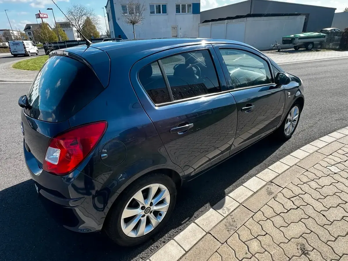 Gebraucht Opel Corsa Active 87 PS (63 kW) 2013 Blau Kleinwagen