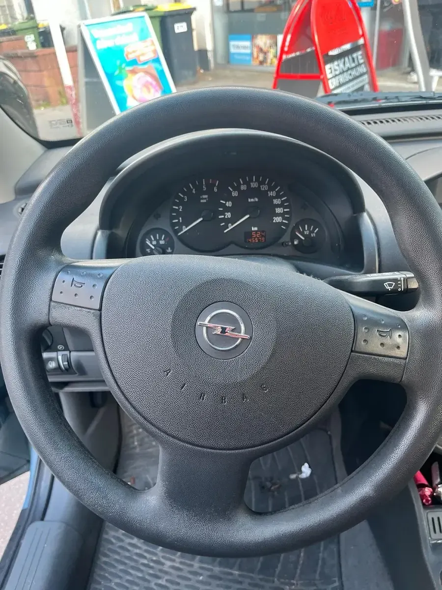 Używany Opel Combo 75 KM (55 kW) 2004 Niebieski Minivan