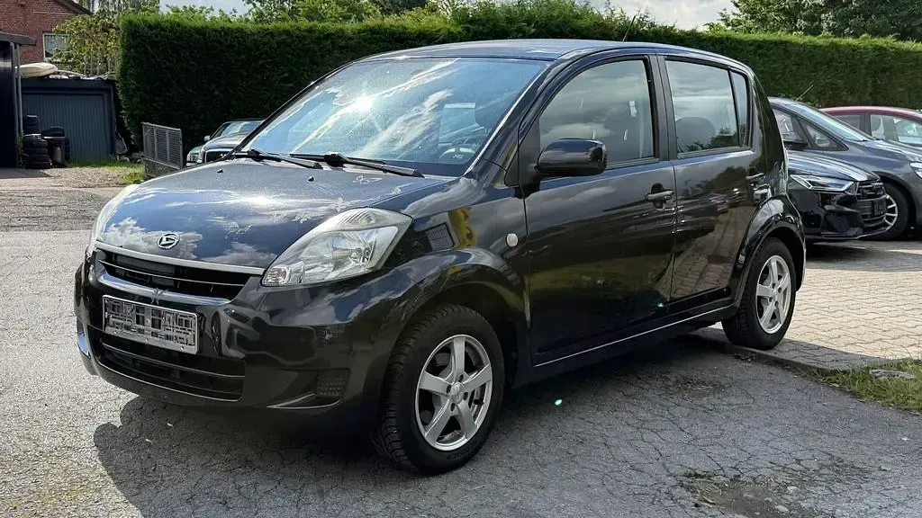 Gebraucht Daihatsu Sirion 69 PS (50 kW) 2009 Schwarz Kleinwagen