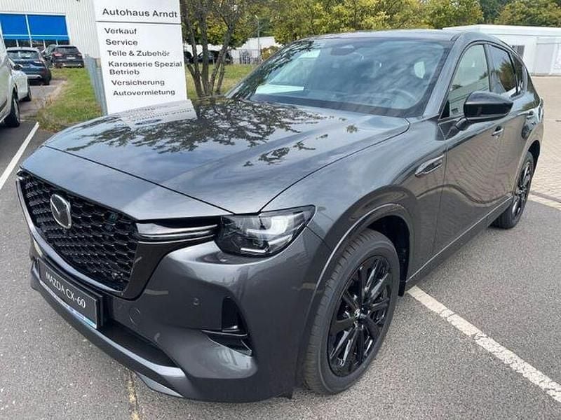 Machine grey (46g) Gebraucht 2025 Mazda CX-60 Homura-Line SUV | 55.450 € (Teuer) - Bild 1/4