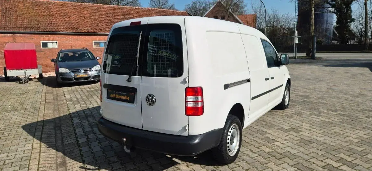 Second-hand VW Caddy Maxi 102 CP (75 kW) 2014 Alb Monovolum