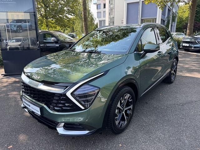 Experience green metallic Gebraucht 2024 Kia Sportage 4 SUV | 30.900 € (Guter Preis) - Bild 1/4