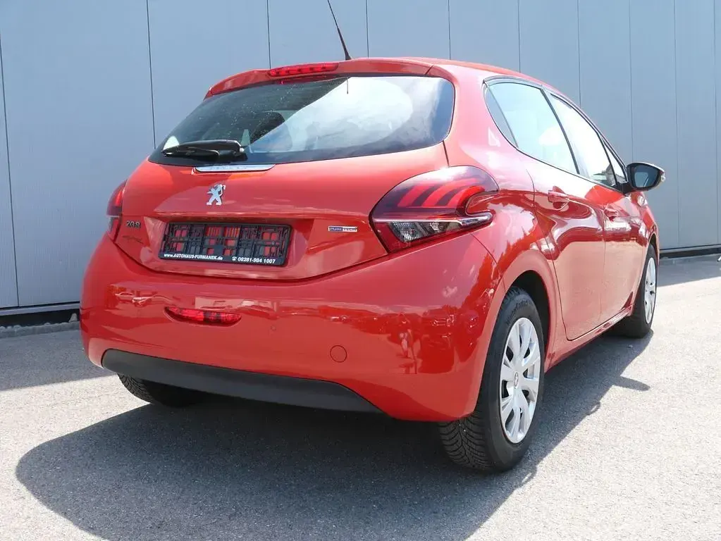 Gebraucht Peugeot 208 Active 82 PS (60 kW) 2018 Orange Kleinwagen
