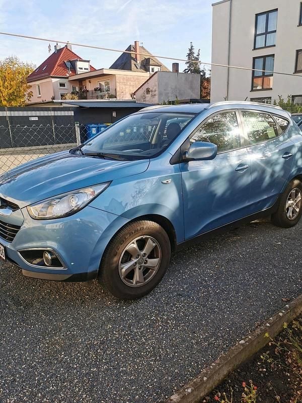 Blau Gebraucht 2013 Hyundai Tucson SUV | 7.500 € (Fairer Preis) - Bild 1/4