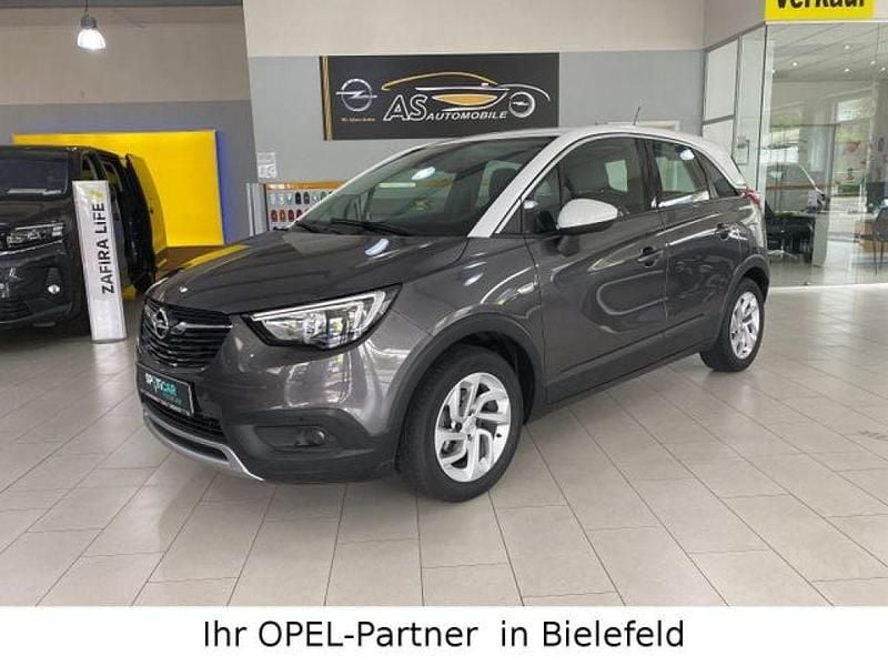 Mondstein grau/e:vulkan grau (metallic) Gebraucht 2019 Opel Crossland X Innovation SUV | 12.990 € (Fairer Preis) - Bild 1/4