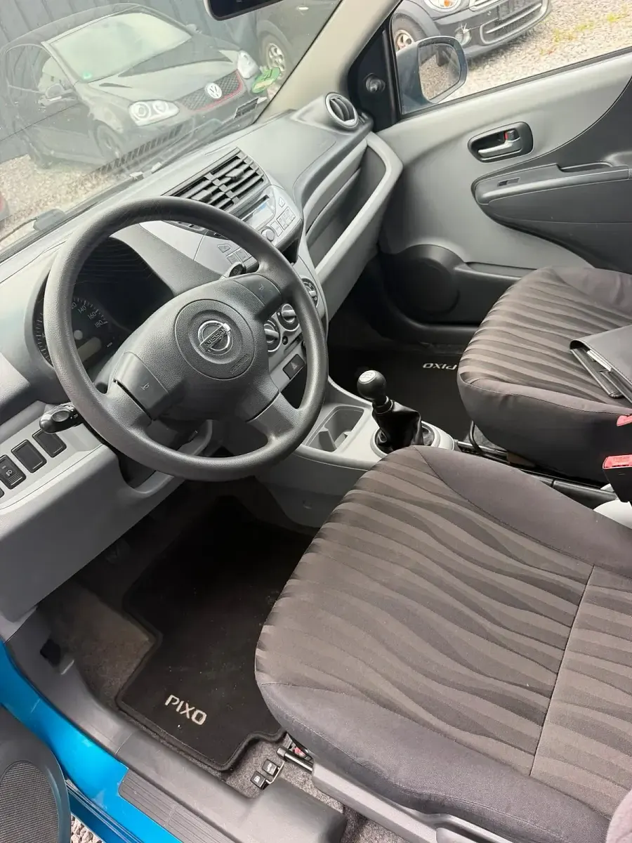 Gebraucht Nissan Pixo 68 PS (50 kW) 2009 Blau Kleinwagen