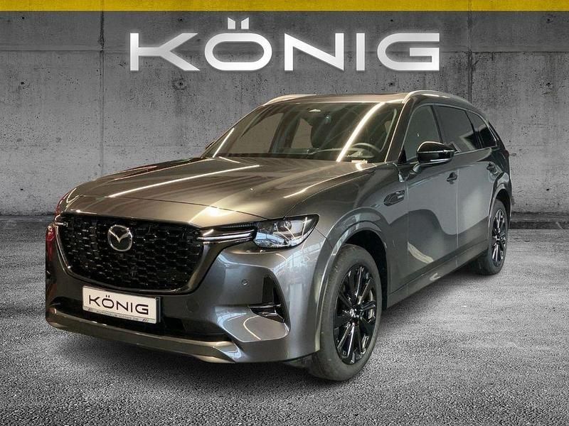 Grau Gebraucht 2024 Mazda CX-80 Homura-Line SUV | 53.997 € (Fairer Preis) - Bild 1/4
