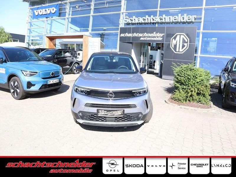 Quarz silber metallic Gebraucht 2021 Opel Mokka Business Elegance SUV | 17.390 € (Fairer Preis) - Bild 1/4