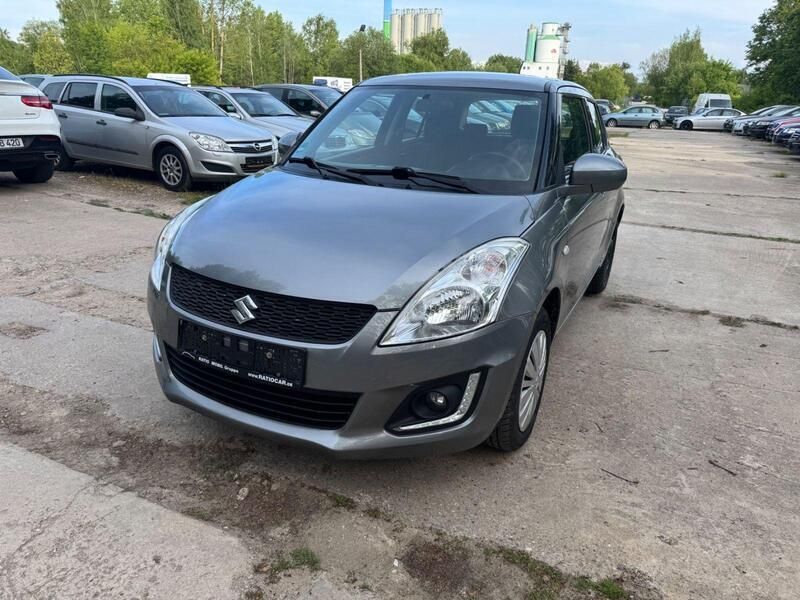 Grau Gebraucht 2015 Suzuki Swift Club Kleinwagen | 7.499 € (Guter Preis) - Bild 1/4