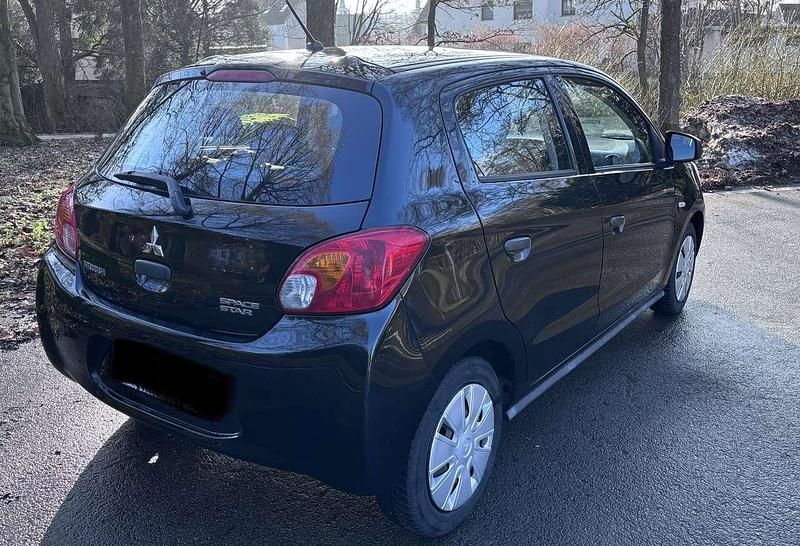 Gebraucht Mitsubishi Space Star 71 PS (52 kW) 2015 Schwarz Limousine