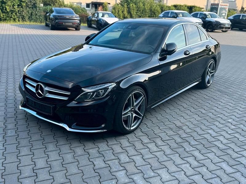 Schwarz Gebraucht 2015 Mercedes C220 AMG line Limousine | 19.500 € (Teuer) - Bild 1/4