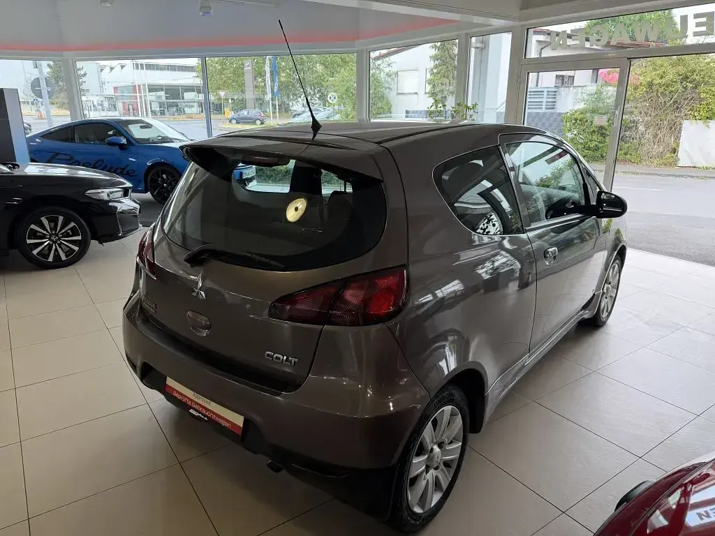 Gebraucht Mitsubishi Colt Motion 95 PS (69 kW) 2013 Braun Limousine