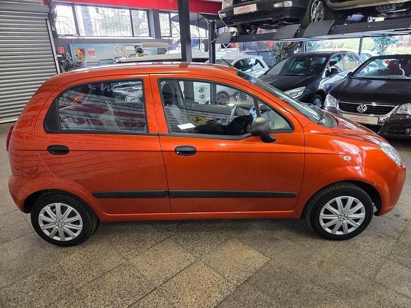 Second-hand Chevrolet Matiz 52 CP (38 kW) 2009 Portocaliu Hatchback