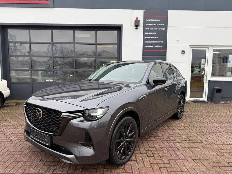 Machine grey Gebraucht 2023 Mazda CX-60 Homura-Line SUV | 35.900 € (Fairer Preis) - Bild 1/4