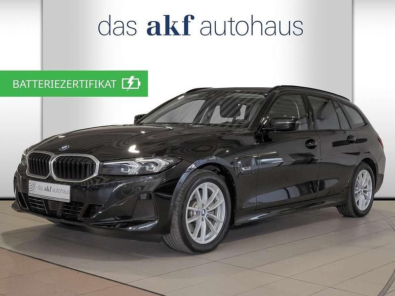 Black sapphire Gebraucht 2022 BMW 320e Kombi | 29.350 € (Guter Preis) - Bild 1/4