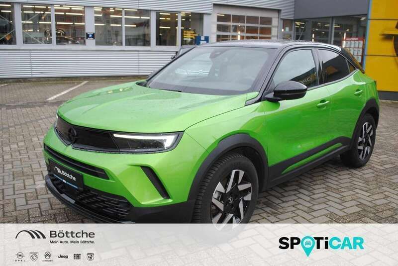 Lackierung matcha green/typ aussenverkleidung metalliclackierung Gebraucht 2023 Opel Mokka-e GS Line SUV | 19.780 € (Superpreis) - Bild 1/4