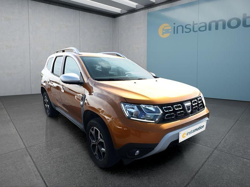 Second-hand Dacia Duster 101 CP (74 kW) 2021 Portocaliu SUV
