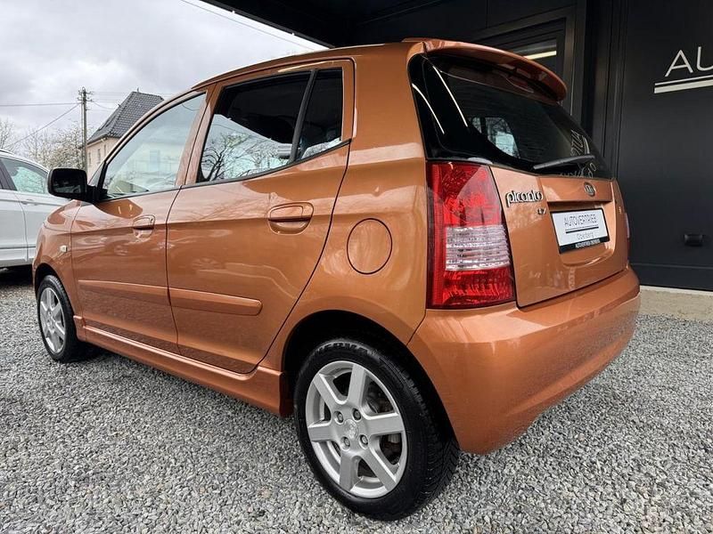 Gebraucht Kia Picanto 65 PS (47 kW) 2006 Orange metallic Kleinwagen