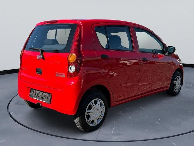 Gebraucht Daihatsu Cuore 69 PS (50 kW) 2009 Rot Kleinwagen