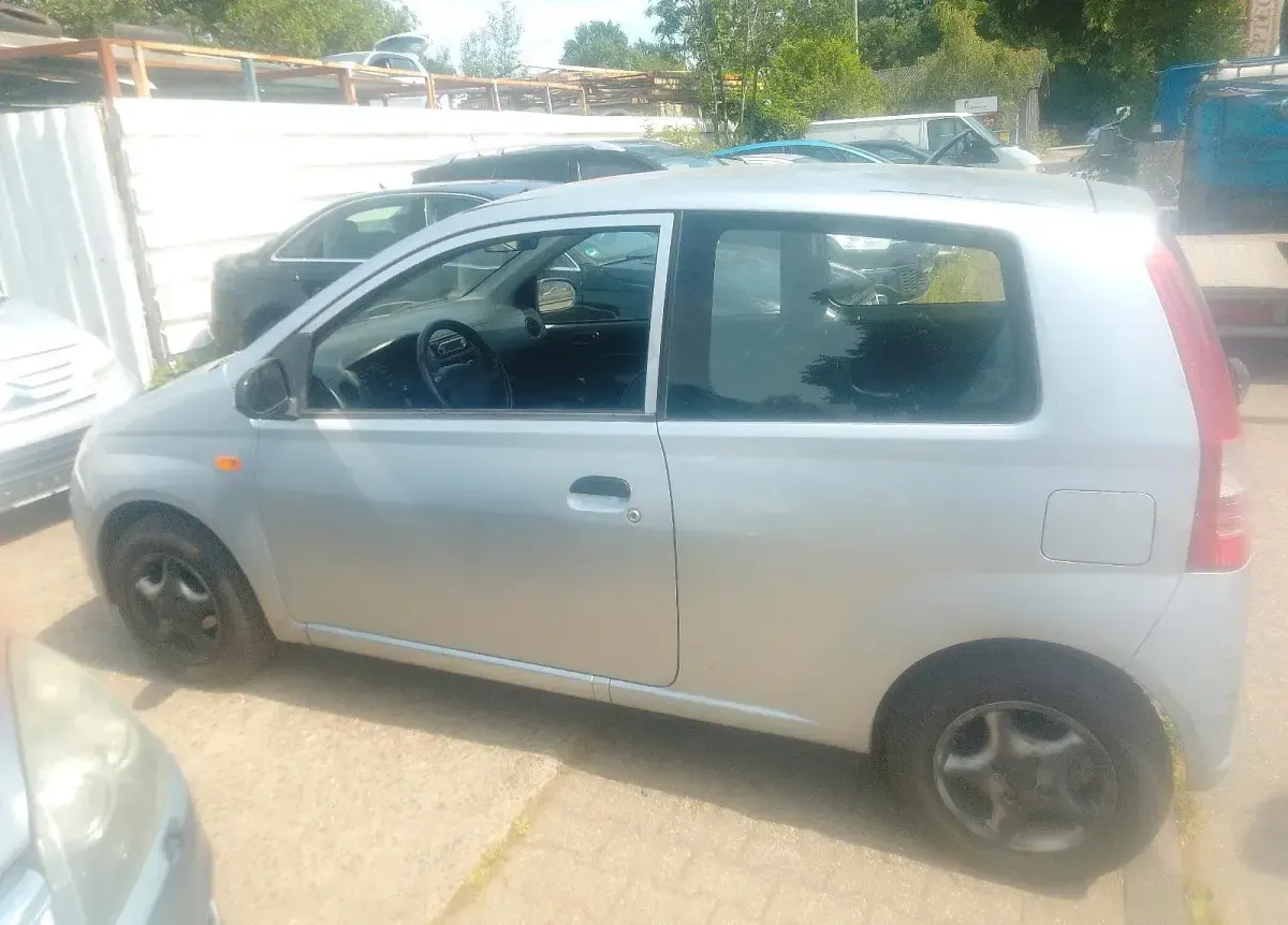 Gebraucht Daihatsu Cuore 60 PS (44 kW) 2004 Grau Kleinwagen