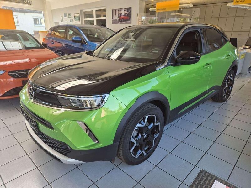 Matcha green/ikone gruen Gebraucht 2021 Opel Mokka-e Ultimate SUV | 20.890 € (Teuer) - Bild 1/4