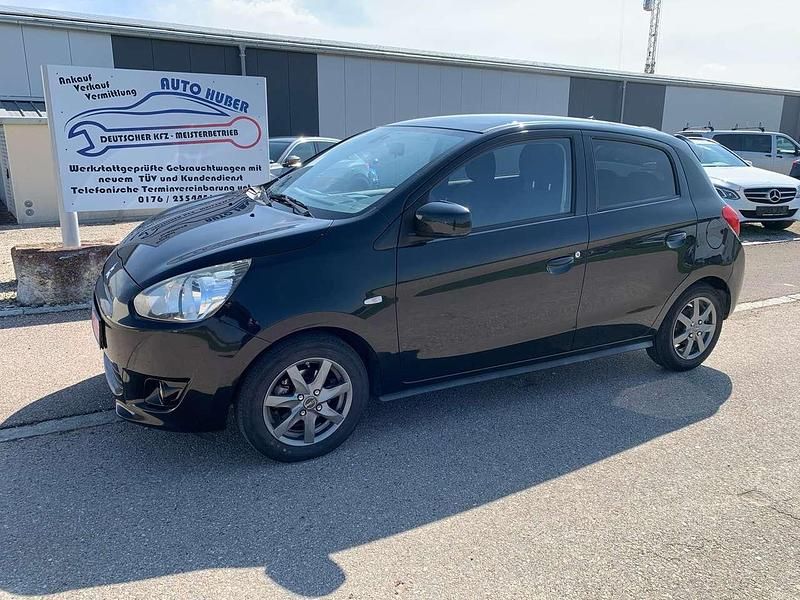 Magicschwarz (p) Gebraucht 2016 Mitsubishi Space Star Diamant Edition Kleinwagen | 6.299 € (Guter Preis) - Bild 1/4