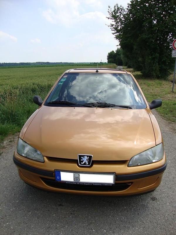 Gebraucht Peugeot 106 82 PS (60 kW) 1997 Gold metallic Kleinwagen