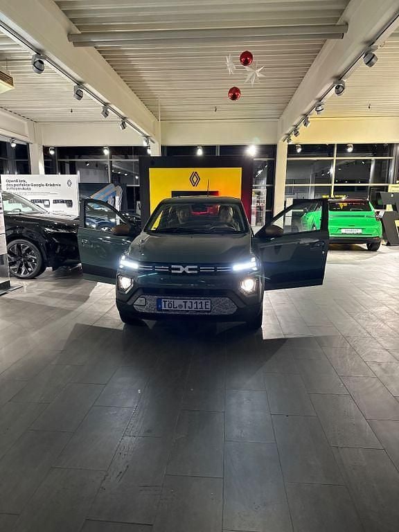 Grün Gebraucht 2025 Dacia Spring Extreme Kleinwagen | 15.990 € (Fairer Preis) - Bild 1/4