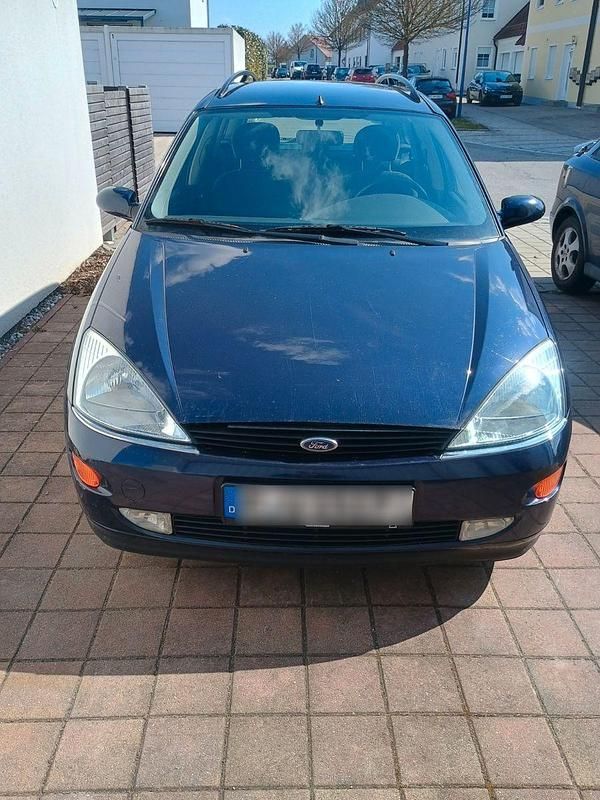 Gebraucht Ford Focus Ghia 116 PS (85 kW) 1999 Blau Kombi