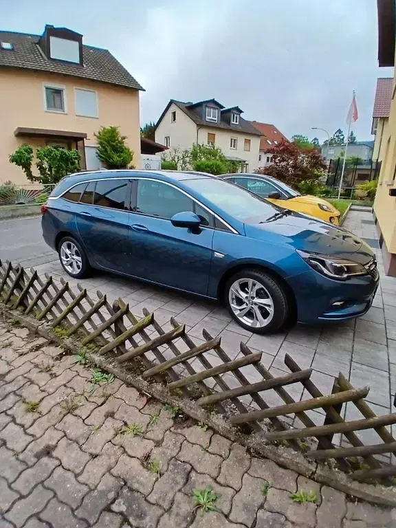 Gebraucht Opel Astra Dynamic 125 PS (91 kW) 2017 Blau Kombi