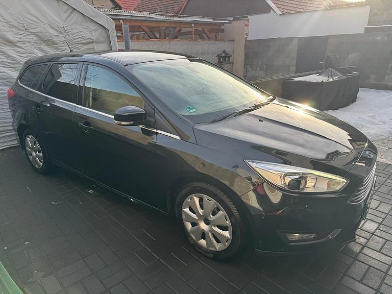 Schwarz Gebraucht 2014 Ford Focus Titanium Kombi | 6.499 € (Fairer Preis) - Bild 1/4