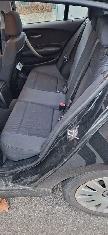 Gebraucht BMW 116 122 PS (89 kW) 2008 Schwarz Kleinwagen