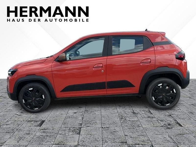 Gebraucht Dacia Spring Extreme 47 kW (65 PS) 2025 Brick red (rot) Kleinwagen