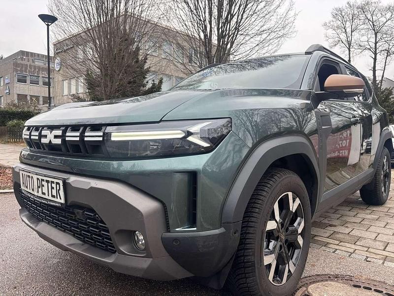 Oxidgrün Gebraucht 2024 Dacia Duster Extreme SUV | 19.990 € - Bild 1/4
