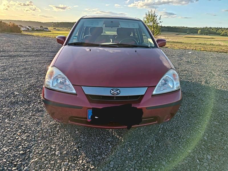 Rot Gebraucht 2002 Suzuki Liana Kombi | 2.000 € (Teuer) - Bild 1/4