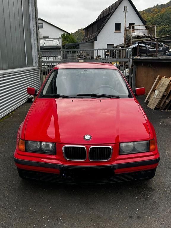 Gebraucht BMW 316 102 PS (75 kW) 1997 Rot Limousine