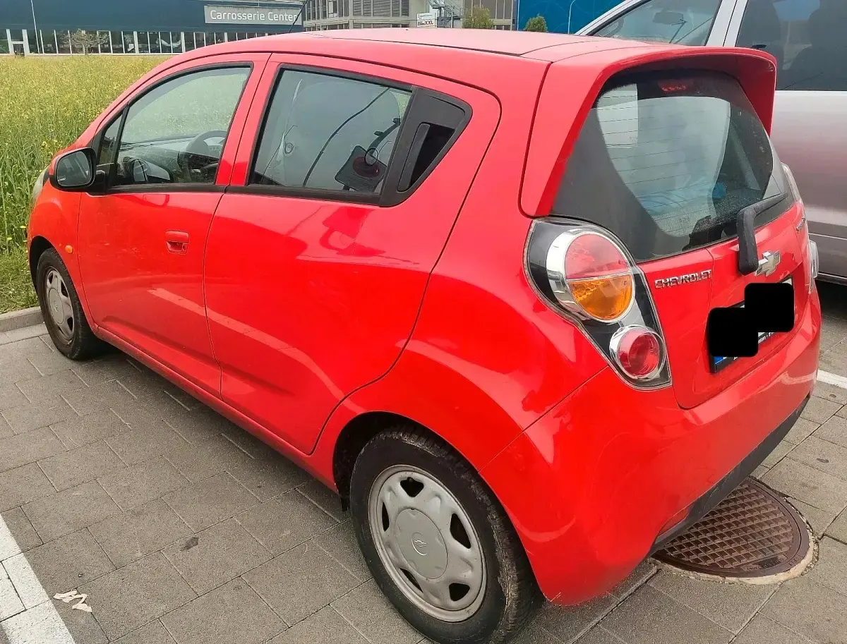 Second-hand Chevrolet Spark 68 CP (50 kW) 2011 Roșu Hatchback