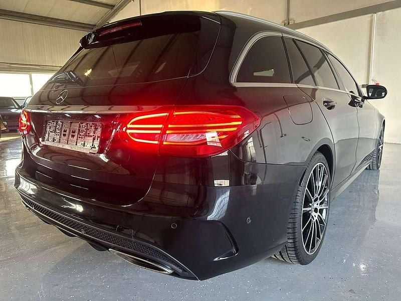 Gebraucht Mercedes C250 AMG line 211 PS (155 kW) 2018 Obsidianschwarz Kombi