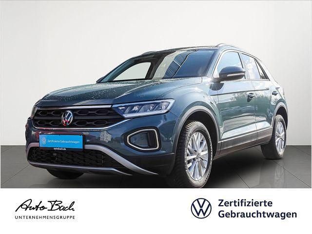 Blau (petroleum blue metallic) Gebraucht 2024 VW T-Roc Life SUV | 22.980 € (Guter Preis) - Bild 1/4