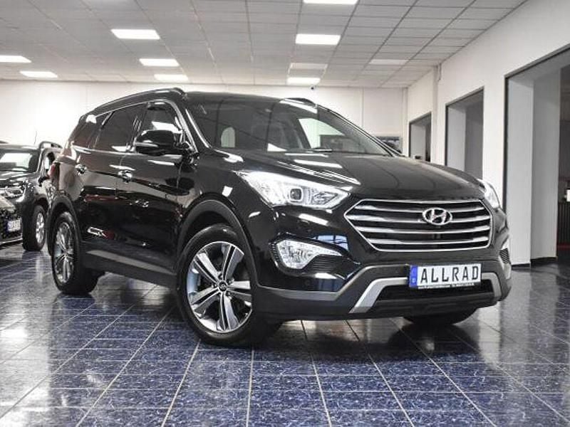Schwarz Gebraucht 2015 Hyundai Grand Santa Fe SUV | 16.770 € (Superpreis) - Bild 1/4